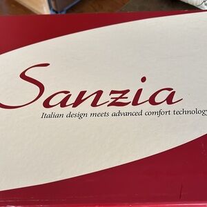 Black leather Italian boots.